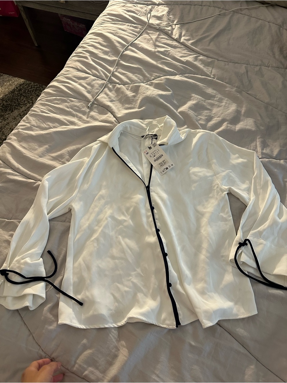 White Button-Front Blouse with Black Trim